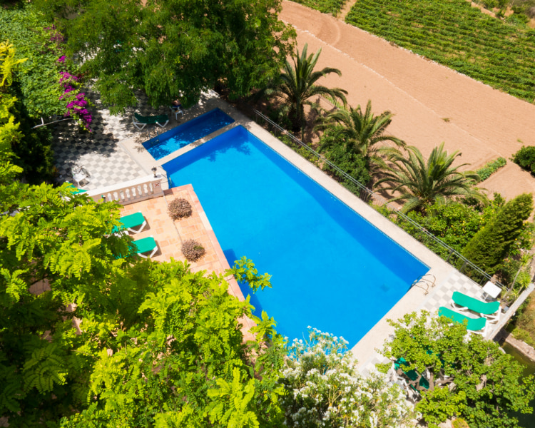 Swimming pool of the Hostal Swimming pool of Sa Baronia seen from above